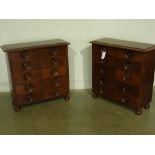 A pair of mahogany ten drawer chests wit