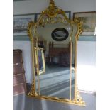 An ornate gilt overmantel mirror - Heigh