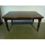 A late Victorian windout dining table in