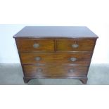 A 19th century mahogany four drawer ches