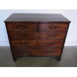 A Georgian mahogany five drawer chest -