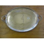 A large silver plated twin handled tray