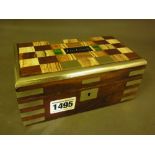 A small hardwood box inlaid with specime