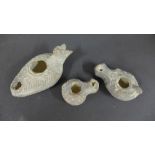 Three Ancient Roman terracotta oil lamps