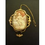 A shell cameo brooch - Carved to depict