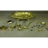 An assortment of silver flatware and a s