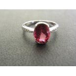 A 9ct gold tourmaline and diamond ring -