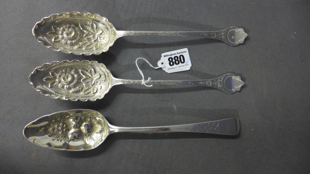 A pair of Victorian silver berry spoons