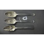 A pair of Victorian silver berry spoons