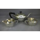 A silver teapot and milk jug - Birmingha