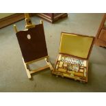 A table easel & paint box with contents