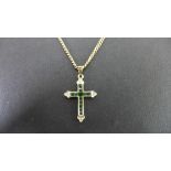 A 9ct gold emerald and diamond cross pen