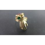 A 9ct gold gem-set hand ring - Set with