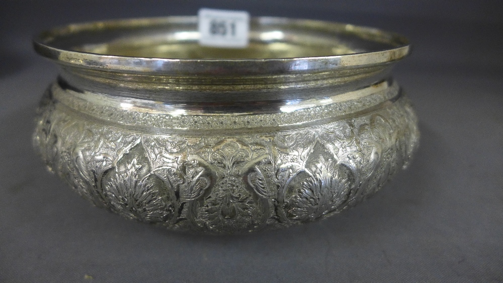 An Eastern silver bowl with embossed and