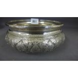 An Eastern silver bowl with embossed and
