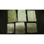 A collection of six assorted silver ciga