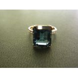 A 9ct gold topaz and diamond ring - Hall