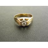 A 9ct gold diamond single-stone ring - T