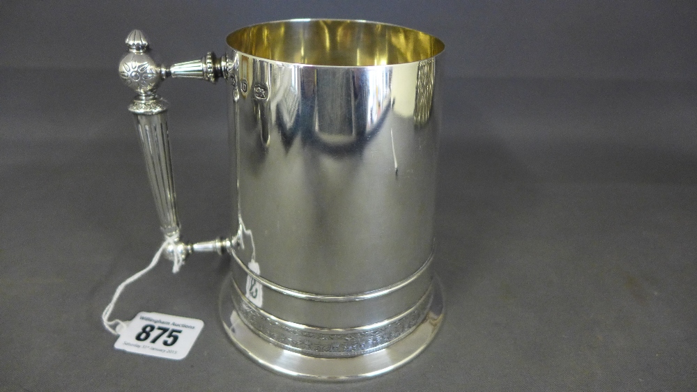 A silver tankard by Elkington & Co - of