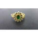 A 22ct gold green-gem and cubic zirconia