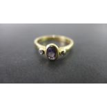 A 9ct gold amethyst and diamond dress ri