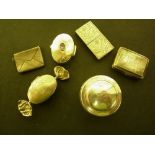 A collection of four small silver boxes,