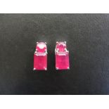 A pair of ruby ear-clips - Stamped 925 -