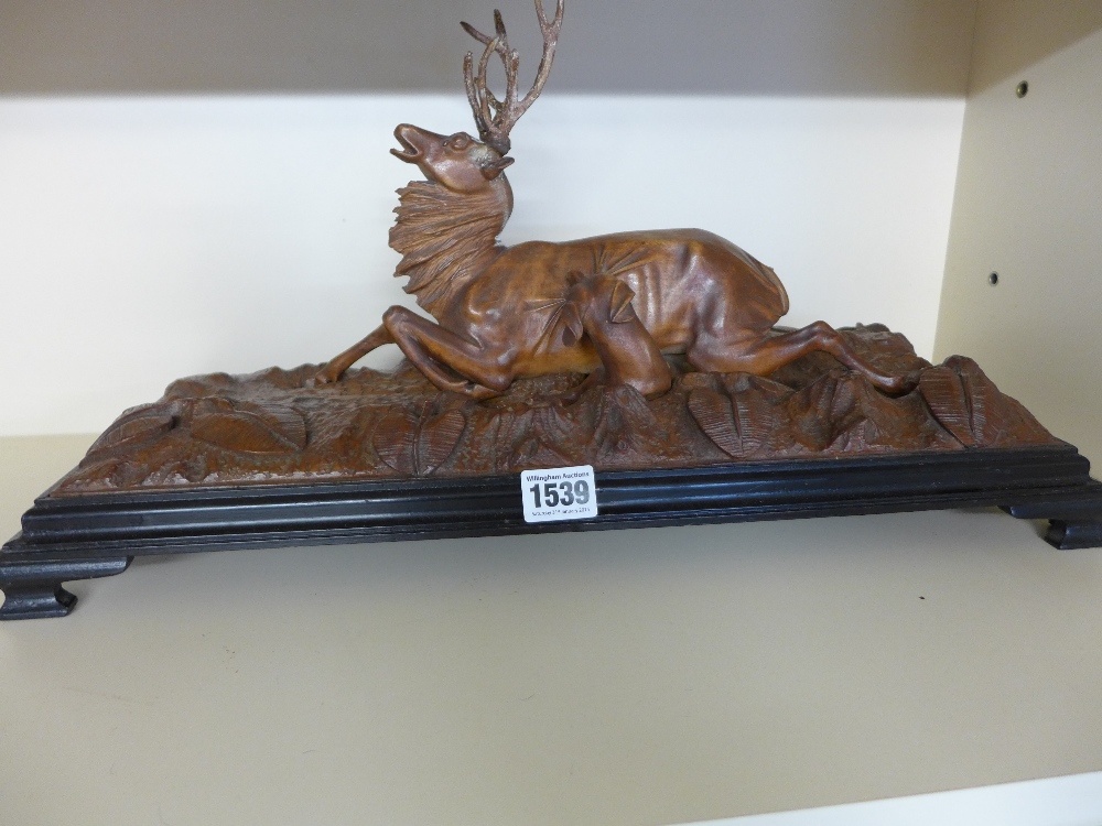 A Black Forest Limewood carving of Stag