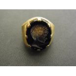 A carved reverse intaglio signet ring -