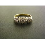 A diamond three stone diamond ring - The