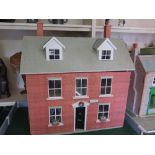 A Georgian style dolls house and content