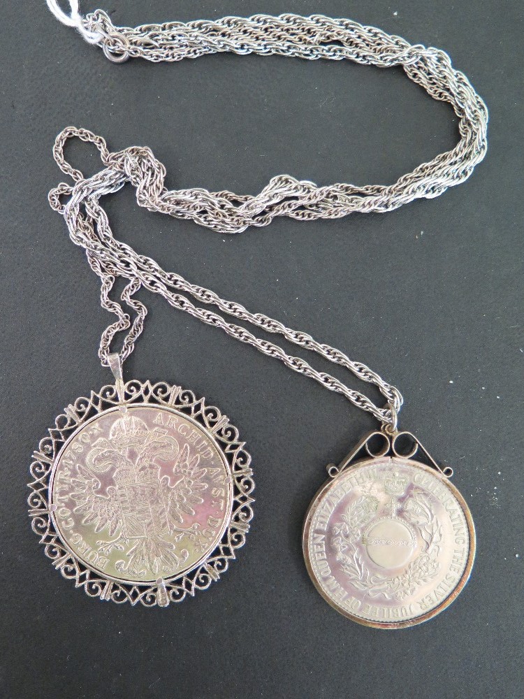 Two silver coin pendants  - To include a