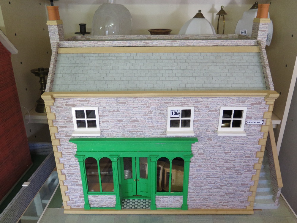 A Georgian style dolls house and content