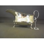 A Mappin and Webb silver gravy boat with