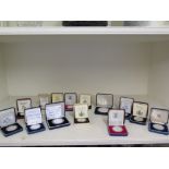 A collection of silver proof coins inclu