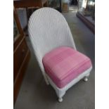 A Lloyd Loom nursing chair