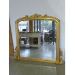 A Victorian style overmantel gilt mirror