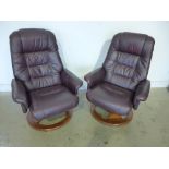 A pair of pre owned brown leather swivel