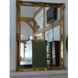 A modern gilt mirror - 95 cm x 67 cm