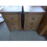 A pair of display oak bedside chests - H