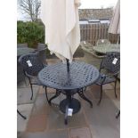 A Bramblecrest Ancona circular table with two chairs, a parasol and base - Diameter 100 cm - with