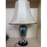 A Moorcroft Arabesque table lamp with shade - Height 60 cm