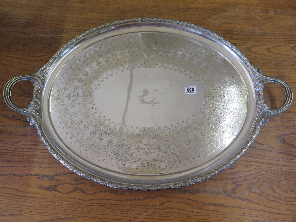 A large silver plated twin handled tray