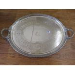 A large silver plated twin handled tray