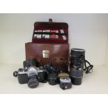 A Pentax S1a camera body, three lenses,