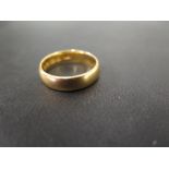 A 22ct gold band ring - Hallmarked Birmi