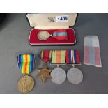 A group of three World War II medals - t