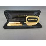 A boxed gold plated Waterman Fountain pe