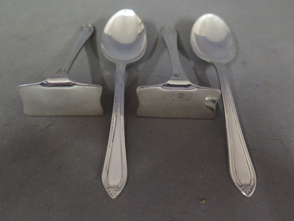 A pair of silver pushers and Christening