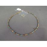 An ancient Egyptian gold and bead neckla